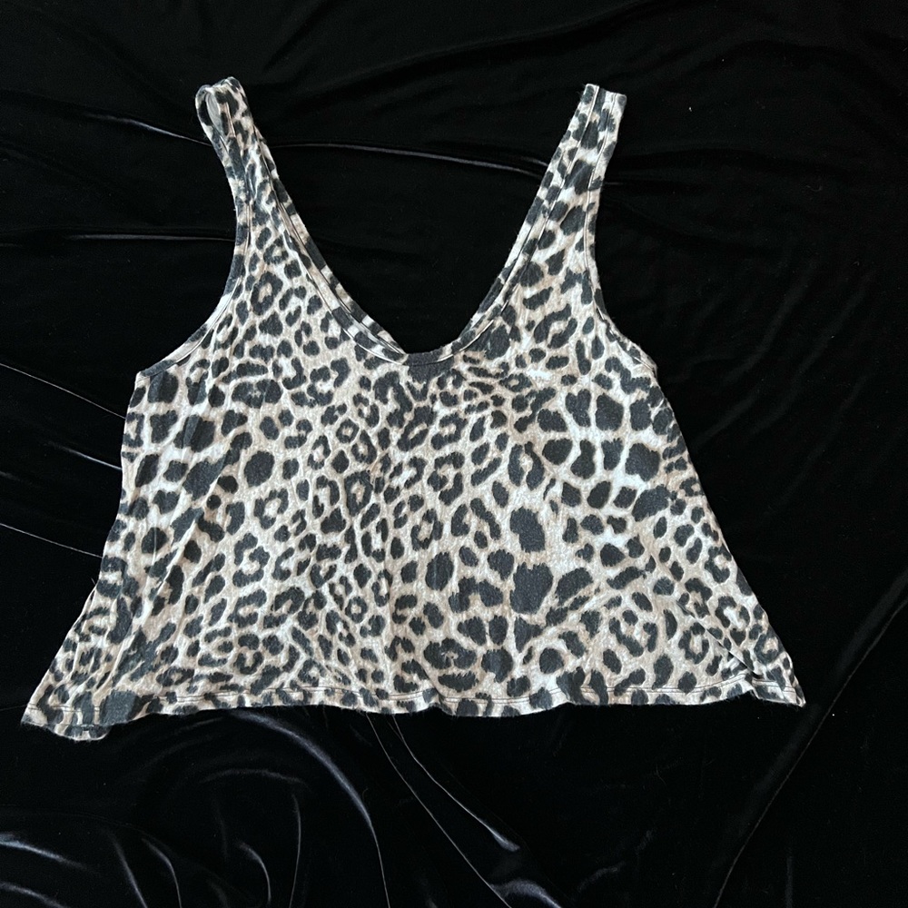 VS vintage yoga tank top. Black tan and some white leaped print. Size S.